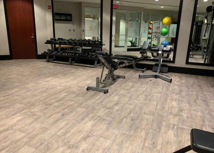 American Real Estate Partners Management fitness center flooring